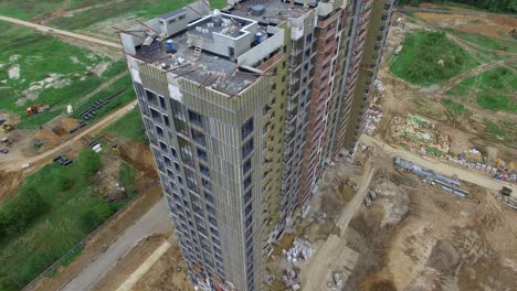 An-aerial-view-of-an-almost-finished-multi-storey-building-on-the-construction-site