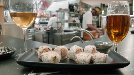Eating-sushi-rolls-in-Japanese-restaurant