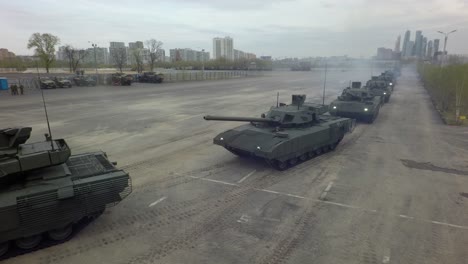 Aerial-shot-of-tanks-in-columns-setting-off-from-military-base-Russia