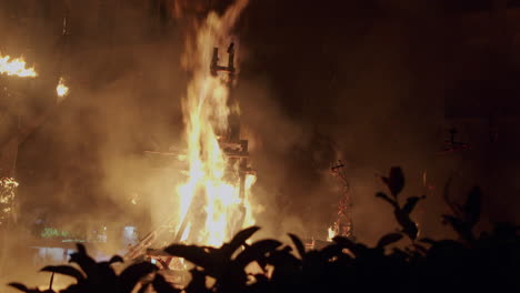 Las-Fallas-street-sculpture-is-burnt-in-night-festive-bonfire-Spain