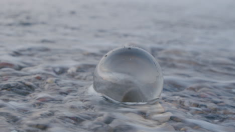 Glass-ball-on-the-seashore