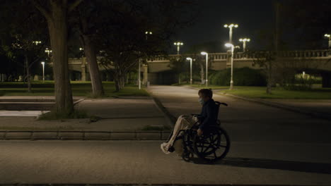 Lonely-walk-of-a-disabled-kid-in-evening-park