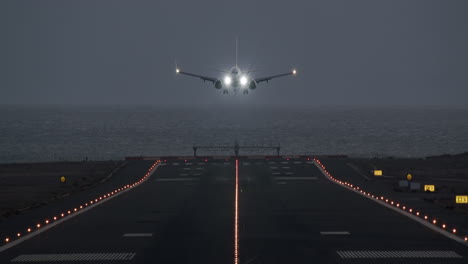 Airplane-landing-at-the-island-airport-in-the-dusk