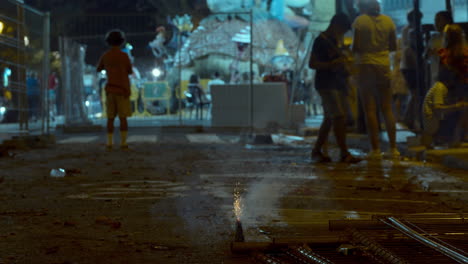 Pyrotechnics-in-night-street-of-Valencia-during-Las-Fallas-festival