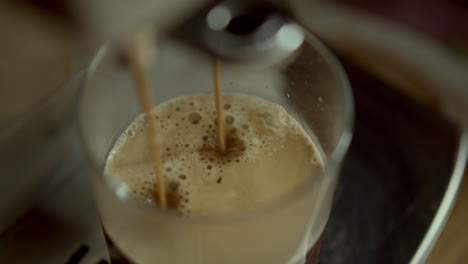 Coffee-machine-making-invigorating-americano