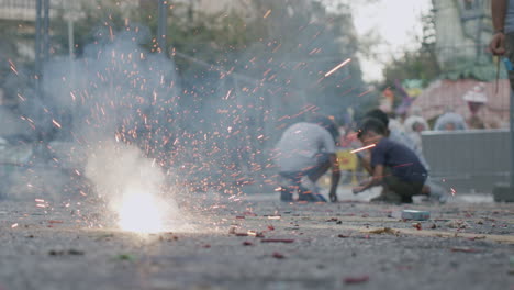 Children-and-exploding-firecracker-on-Las-Fallas-Spain