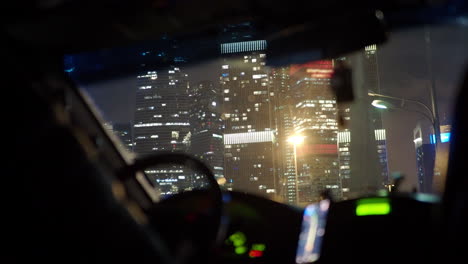Car-view-to-Moscow-skyscrapers-illuminated-at-night-Russia