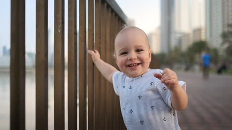 Laughing-boy-at-the-age-of-1-year-dancing.