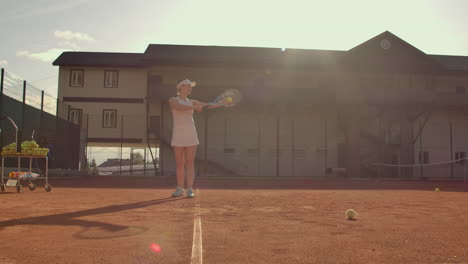 Tennis-player-prepares-to-serve-ball-during-tennis-match