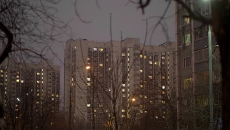 Apartment-houses-in-the-dusk-autumn-cityscape-with-bare-trees