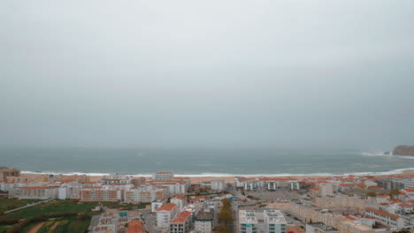 Nazare-resort-town-with-ocean-scene-and-hotels-on-the-coast-Portugal