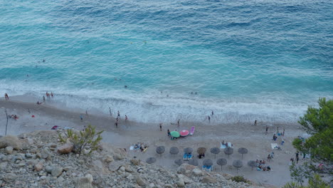 Top-view---people-resting-at-the-sea-coast