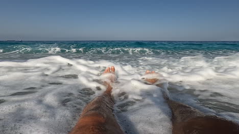 POV-of-legs-of-a-man-in-the-sea