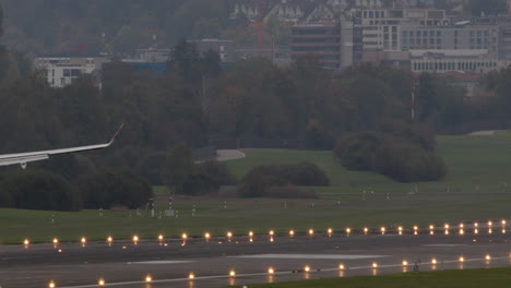 Super-slow-motion-shot-of-airplane-landing-at-the-airport