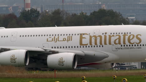 Emirates-Airbus-A380-800-Superjumbo-Jet-stands-at-the-airport