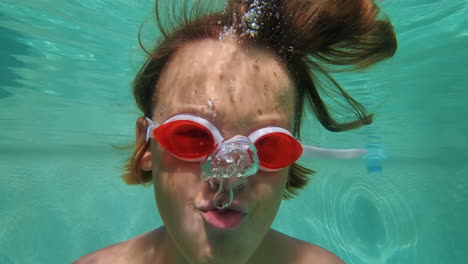 Slow-motion---teenager-in-an-underwater-pool