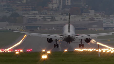 Airplane-landing-at-dusk
