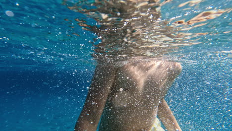 Underwater-shot-of-a-teenager