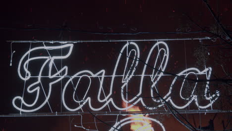 Banner-with-the-word-Falla-on-the-street-at-night