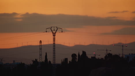 Power-line-pylons-at-sunset