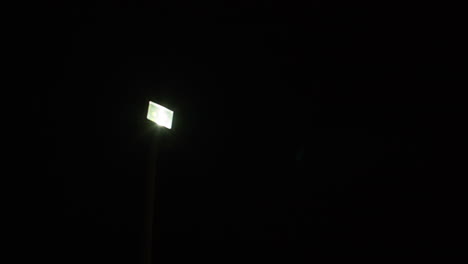 Flashing-spoiled-lantern-at-night-7