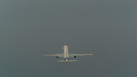 Airplane-in-the-cloudy-sky
