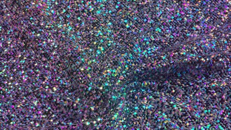 A-Shimmering-3D-Swirl-of-Sequin-Fabric-Radiates-a-Spectrum-of-Colors-3D-Animation