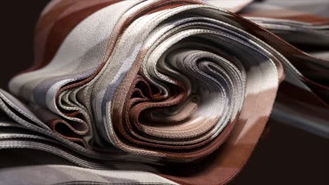 Abstract-3D-Wave-of-Intertwined-Fabric-Textures-in-Earthy-Tones-3D-Animation
