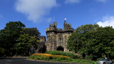 Lancaster-Castle-with-flowers-and-deep-blue-sky