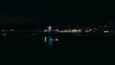 Night-dolly-in-drone-shot-of-santa-monica-pier