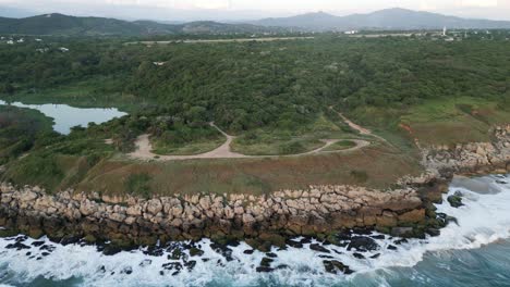 Puerto-escondido-Oaxaca-Coastline-aerial-footage-of-sea-ocean-water-waves-in-Mexico