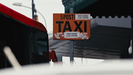 Naples-Taxi-Stand-Signage,-Italy.-City-detail