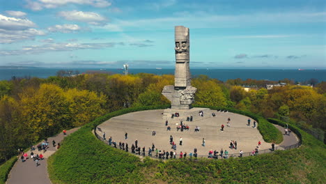 Drone-flying-above-historical-monument-in-Westerplatte,-Gdansk,-Poland