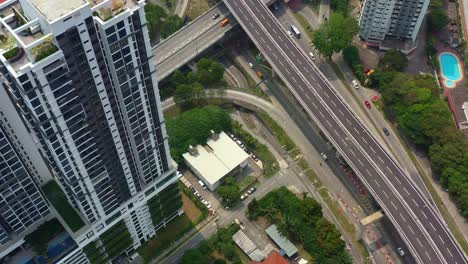Aerial-birds-eye-view-drone-capturing-high-rise-condominium,-urban-development-of-inner-city-suburbs-and-overpass-and-underpass-traffics,-Seputeh,-Selangor,-Kuala-Lumpur,-Malaysia