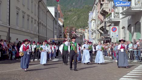 The-Marching-Band-of-Riffian---Rifiano-during-the-annual-Grape-festival-in-Meran---Merano,-South-Tyrol,-Italy