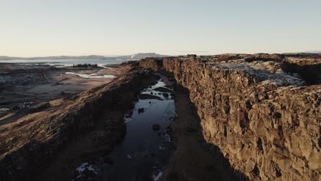 Drone-dolly-volcanic-landscape-Icelandic-thingvellir-national-park,-Oxararfoss
