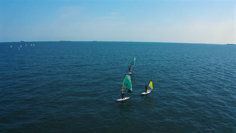 panoramic-drone-view-of-windsurfing-on-the-blue-water-of-baltic-sea-in-Poland