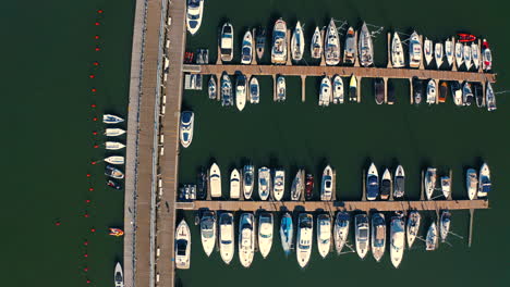 Top-view-of-beautiful-marina-with-moored-luxury-yachts-and-motorboats-in-Sopot,-Poland