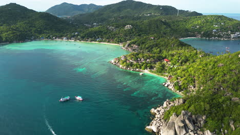 Aerial-view-of-scenic-dreamy-seascape-in-south-east-Asia,-koh-tao-Thailand-pristine-ocean-water-unpolluted-natural-green-forest-with-cliff-and-seascape