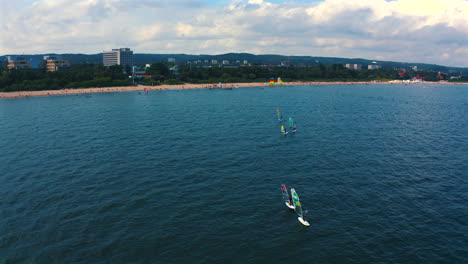 aerial-view-of-windsurfing-on-the-blue-water-of-baltic-sea-in-Poland