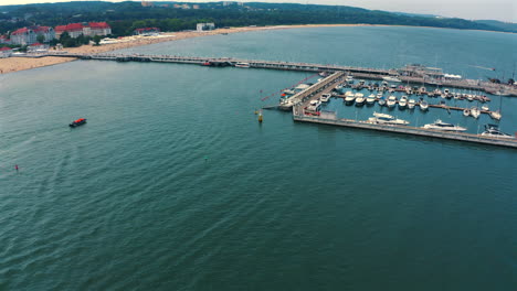 Drone-top-view-of-marina-with-luxurious-yachts-and-ships-in-Sopot,-Poland
