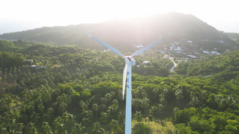 Aerial-Rotation-Around-A-Single-Wind-Turbine-Installed-In-The-Chalok-Baan-Kao-Mountain-Range-Of-Koh-Tao,-Thailand