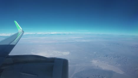 Airplane-Flying-Mid-Air-View-From-Inside-Window