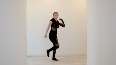 Slow-motion-Caucasian-female-dance-performance-indoors