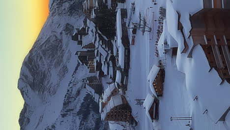 Quiet-morning-at-Avoriaz-Ski-Resort-Village-in-French-Alps,-vertical-panning-shot