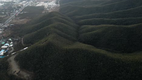 Aerial-view-of-the-lush-mountains-surrounding-Monterrey,-Mexico