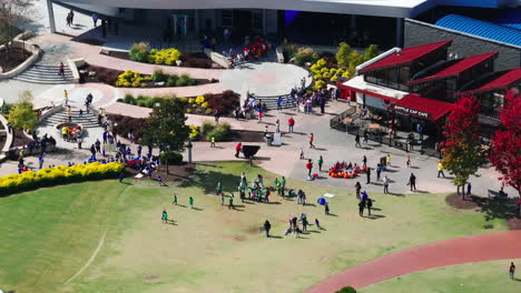 Aerial-view-of-groups-of-children-spending-time-in-public-park