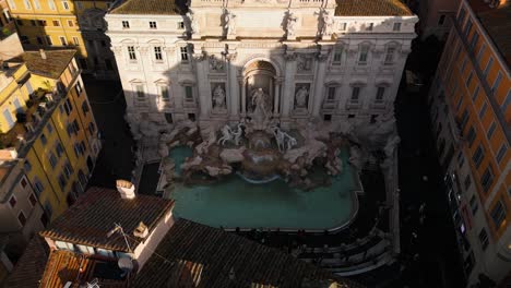 Aerial-Pullback-Away-from-Fontana-di-Trevi-in-Rome,-Italy