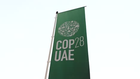 COP28-UAE-flag-during-the-event-at-Expo-City-in-Dubai,-United-Arab-Emirates