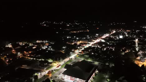 Night-aerial-view-over-the-city-Pai-in-the-Mae-Hong-Soon-Province,-Thailand